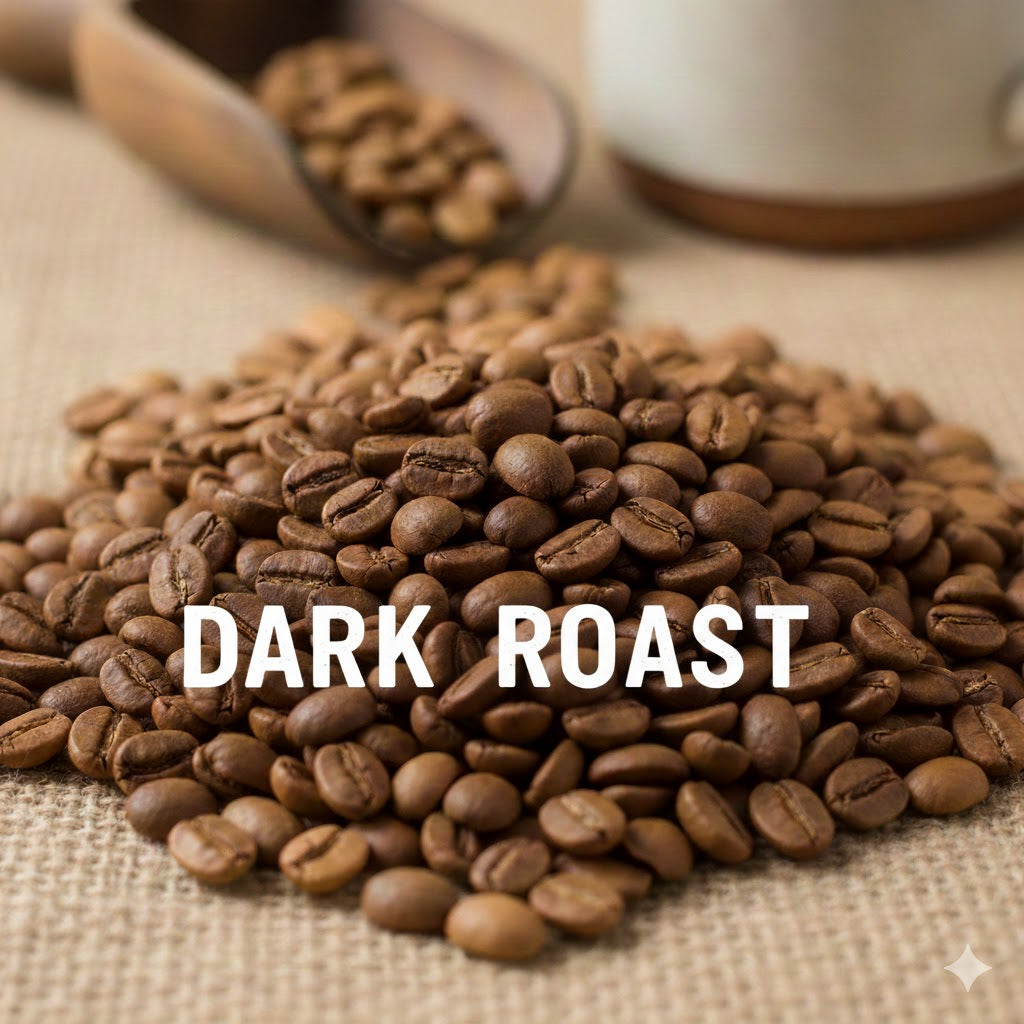Dark roast organic coffee beans with an oily sheen on a white background
